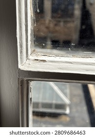 The upper corner of a sash window