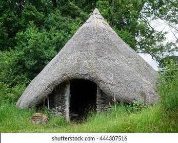 UPPER DICKER, EAST SUSSEX/ UK - JUNE 26: Reconstruction Of A Late Bronze Age Roundhouse In The Grounds Of Michelham Priory In Upper Dicker, East Sussex UK On June 26, 2016