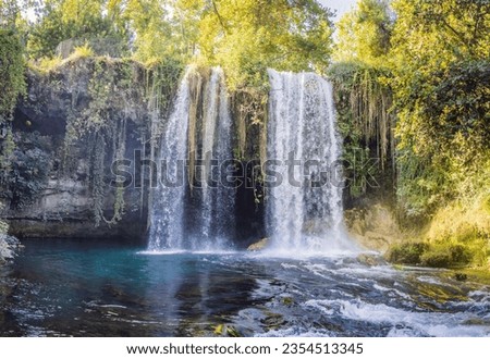 Upper Duden Waterfall is called as Alexander Falls. The paradise like hinterland of the waterfall is all in green in Antalya, Turkey. Tourism and travel destination photo