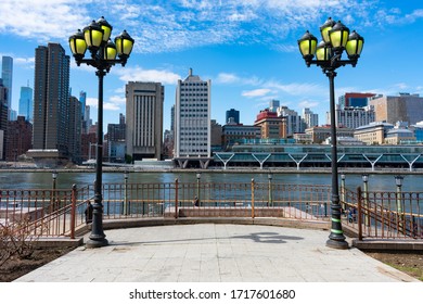 The Upper East Side Skyline And Street Lights Viewed From Roosevelt Island During Spring In New York City