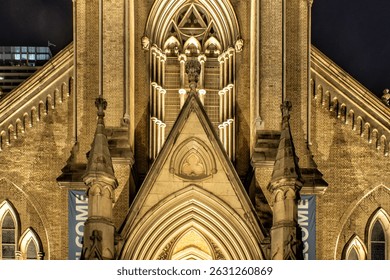 Upper Facade and Base of Tower of St. James' Anglican Cathedral in Toronto By Night