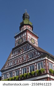 Upper front facade and clock tower of town hall in Kirchheim unter Teck, Baden-Wuerttenberg, Germany