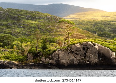 Upper lake in Killarney view to the rocks and hills from a boat. Lovely atmosphere