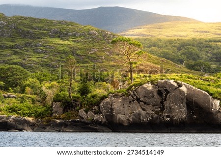 Upper lake in Killarney view to the rocks and hills from a boat. Lovely atmosphere