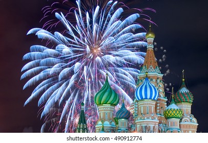 Upper Part Of  The Saint Basil's Cathedral At The Red Square In Moscow By A Winter Night With Firework As A Background. Roof Is Covered By Snow.