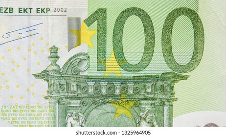 The upper right detail of the 100 Euro bill. Showing the green color bill and monument image