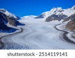 The Upper Salmon Glacier descends between Mount Lindeborg  and Mount White-Fraser