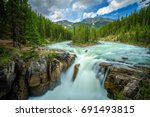 Upper Sunwapta Falls in Jasper National Park, Canada. The water originates from the Athabasca Glacier. Long exposure.