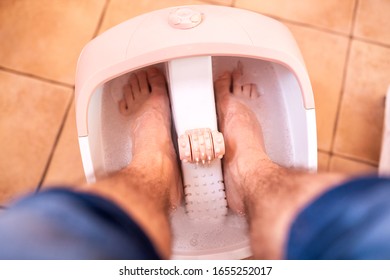 Upper View Of Male Feet Inside Of Foot Bath Tub, Pedicure For Men