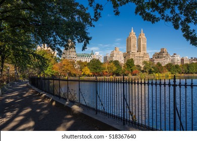 Upper West Side with colorful fall foliage across Jacqueline Kennedy Onassis Reservoir. Central Park West. Manhattan, New York City - Shutterstock ID 518367640