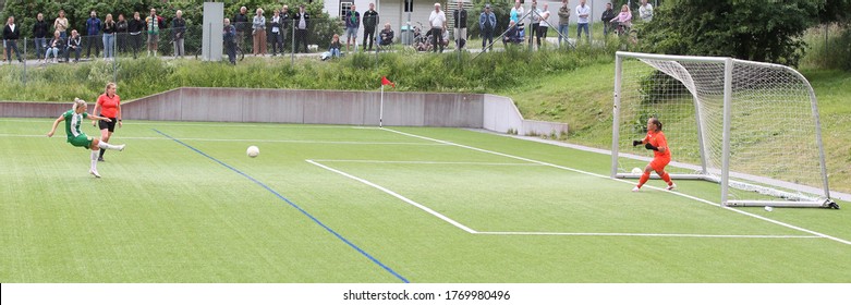 UPPLANDS VÄSBY, SWEDEN - JULY 1, 2020: Emma Jansson score a goal on penalty kick for Hammarby. Football game betweeen Bollstanäs SK and Hammarby in Elitettan, Sweden.