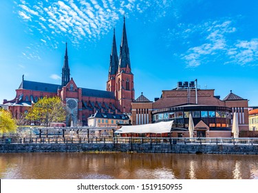 Uppsala cathedral reflecting on river Fyris in Sweden