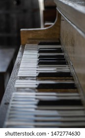 Upright Piano With Missing Keys