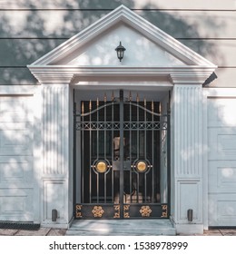 Upscale Family House Decorated Entrance Door With Pediment By The Sidewalk, Athens Greece