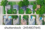 Upscale single-family homes with swimming pool and large backyard in expensive residential neighborhood suburbs Dallas, Texas, straight aerial view detached houses, wooden fence, quite street. USA