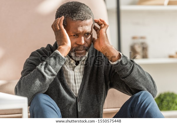 Upset African American Man Sitting On Stock Photo 1550575448 | Shutterstock