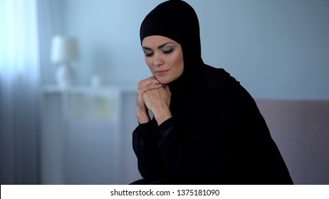 Upset Arab Female In Hijab At Home, Suffering From Religious Discrimination