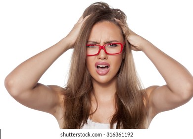 Upset Beautiful Girl With Glasses,has Itching In Her Hair