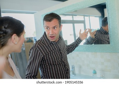 Upset Couple Having An Argument About The New Bathroom