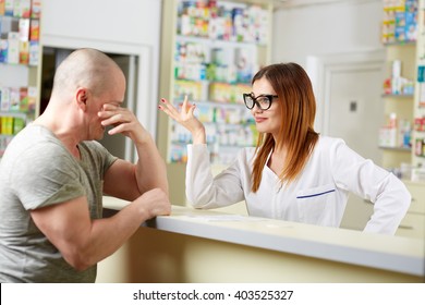 Upset Customer At The Counter Of A Pharmacy