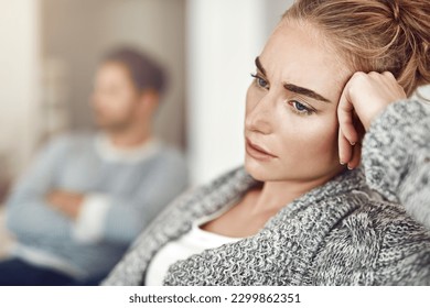 Upset, depression and woman in argument with her boyfriend in the living room of their apartment. Sad, disappointed and moody female person with conflict, fight or breakup with partner at their home. - Powered by Shutterstock