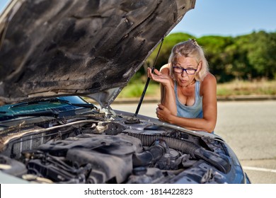 Upset Driver Woman In Front Of Old Automobile Broken Car Collision Accident In City Road