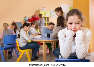 Upset Girl Standing Schoolroom On Background Stock Photo 1056454916 ...