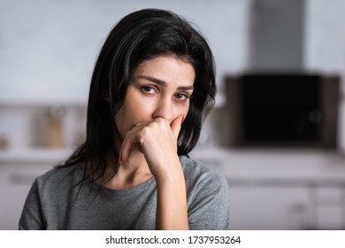 upset and injured woman with bruise covering face, domestic violence concept - Shutterstock ID 1737953264