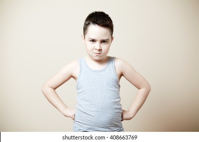 Upset Kid With Hands On Hips