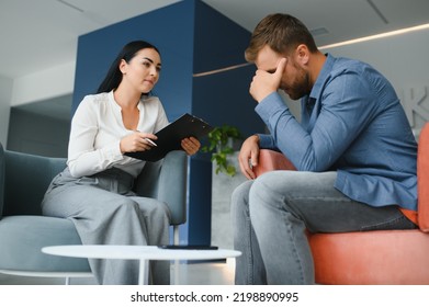 Upset Man Alcoholic Sitting At Psychologist On Psychotherapy Session, Sad Depressed Addicted Drunk Guy Alcohol Addiction Abuse, Alcoholism Concept. Social Service, Psychology Patient.