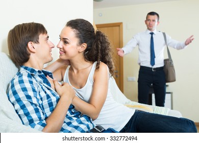 Upset Man Coming Home And Seeing Girlfriend Cheating On Him
