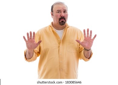 Upset Man Guarding His Privacy Holding Up His Hands In A Stop Or Halt Gesture Indicating He Has Had Enough, Part Of A Series On Body Language, Isolated On White