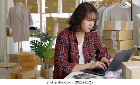 Upset Sad Asia Woman People Or Young Sme Fashion Clothing Online Shop Store Owner Tired And Think Hard Work At Home Office In Bad News Of Covid Crisis Impact Debt Cash Flow Finance, Stock Loss Error.