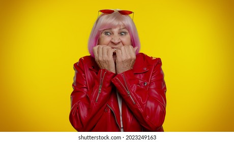 Upset Scared Frightened Elderly Stylish Rocker Granny Woman Biting Nails, Feeling Worried Nervous About Serious Troubles, Stress And Anxiety Disorder, Panic Attack, Guilty. Senior Old Grandmother