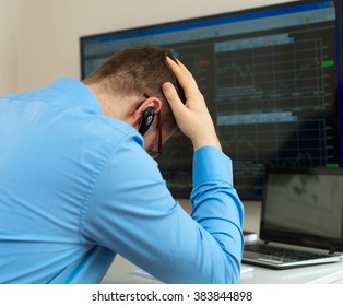 Upset Stock Trader In Front Of Computer.