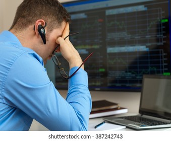 Upset Stock Trader In Front Of Computer.