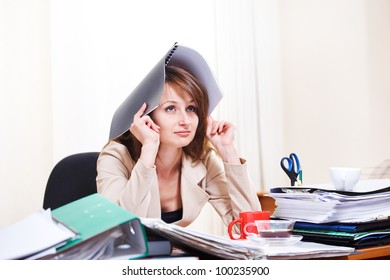 Upset Stressed Young Woman At  Work