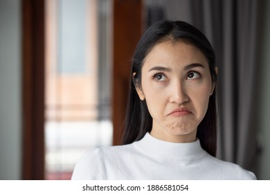 Upset Unhappy Woman Rolling Her Eye	