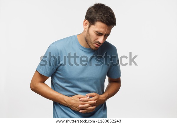 Upset Unhappy Young Man Holding His Stock Photo 1180852243 | Shutterstock