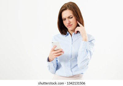 Upset Woman Holding A Cellphone. Angry Young Businesswoman Reading Bad News On Her Cell Phone. Isolated On White Background.