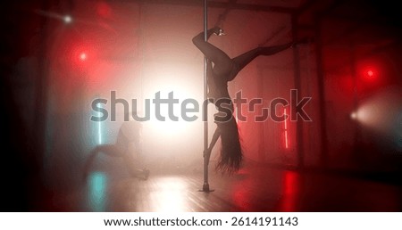 Upside down, dancer or lights with pole for show, tease performance or movement in routine. Flexible artist, agility or exotic dancing in nightclub for seduction, neon or party entertainment