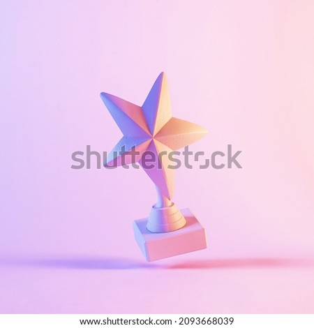 Upside down five pointed star trophy award model. 3D figure, hovering in bright pink surrounding background with shadows