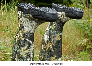 Upside Down Hunting Boots In Weeds