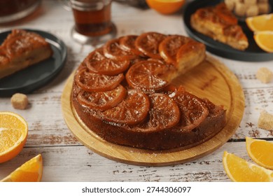Upside down orange cake, ready homemade on the table	
