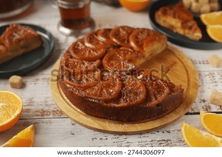 Upside down orange cake, ready homemade on the table	