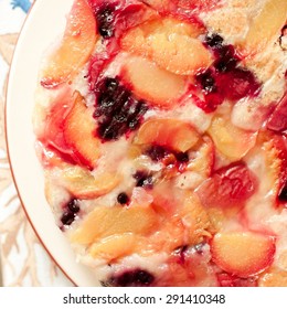 Upside down peach pie closeup. Top view. Tasty breakfast. 