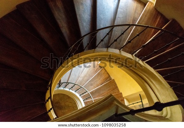 Upside view of a spiral\
staircase