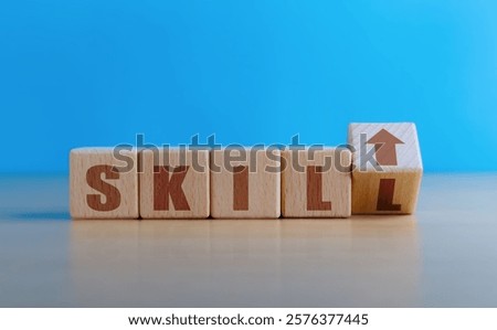 Upskilling, self development, new skill icons on wooden cube
