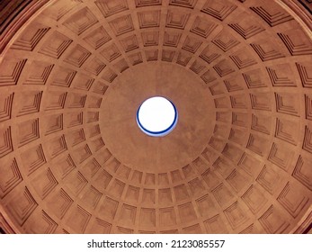 Upward Picture Of The Ceiling Of Pantheon, Famous Landmark Of Rome, Italy, Amazing Architecture Details, Symmetrical Dome With Motifs, A Central Hole Through Which The Light Enters, Selective Focus