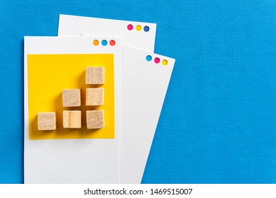 Upward Trend Bar Chart Concept Made With Wooden Block Toys On Paper Cards And Blue Fabric Textured Background